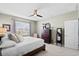 Well-lit bedroom featuring a ceiling fan and a dark wood dresser at 400 Hampstead Ct, Summerville, SC 29486