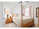 Bright bedroom with four poster bed and side table at 400 Hampstead Ct, Summerville, SC 29486