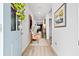 Bright entryway features light wood floors, soothing neutral walls and pleasing decor at 400 Hampstead Ct, Summerville, SC 29486