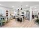 Eat-in kitchen with stainless appliances, a kitchen island with barstool seating and light wood flooring at 400 Hampstead Ct, Summerville, SC 29486