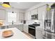 Bright kitchen features stainless steel appliances, modern cabinets and a functional layout at 400 Hampstead Ct, Summerville, SC 29486
