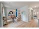 Dining area with a table, surfboard decoration, and ample natural light at 4336 Purdue Dr, North Charleston, SC 29418