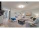 Spacious living room featuring neutral decor, a fireplace, and access to other areas at 4336 Purdue Dr, North Charleston, SC 29418