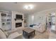 Cozy living room with fireplace, built-in shelves, and comfortable seating at 4336 Purdue Dr, North Charleston, SC 29418