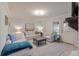 Light-filled living room with modern furnishings, and outdoor access at 4336 Purdue Dr, North Charleston, SC 29418