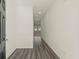 Inviting entryway with stylish gray wood floors, a white wall, and recessed lighting at 4368 Ocean Farm Dr, Summerville, SC 29485