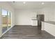 Kitchen and dining area with stainless steel appliances, granite counters, and sliding glass door at 4368 Ocean Farm Dr, Summerville, SC 29485