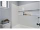 Clean bathroom with a tiled shower and a built in niche for toiletries at 4618 Moss Ct, Charleston, SC 29420