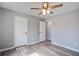 Bedroom with luxury vinyl plank floor and ceiling fan at 4618 Moss Ct, Charleston, SC 29420