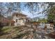 Spacious backyard with deck, pool, stone patio, and a mix of grassy and wooded areas at 4634 O'Hear Ave, North Charleston, SC 29405