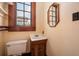 Bathroom with sink, toilet, and window at 4634 O'Hear Ave, North Charleston, SC 29405