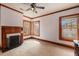 Spacious bedroom featuring a fireplace, natural light, and a cozy, classic atmosphere at 4634 O'Hear Ave, North Charleston, SC 29405