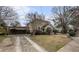 Charming two-story home with a carport, and a well-manicured front yard at 4634 O'Hear Ave, North Charleston, SC 29405