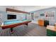 Game room featuring a pool table, television, and wet bar at 4634 O'Hear Ave, North Charleston, SC 29405