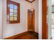 Hallway features hardwood floors and original wood trim at 4634 O'Hear Ave, North Charleston, SC 29405