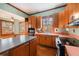 Kitchen featuring wood cabinetry and a kitchen island at 4634 O'Hear Ave, North Charleston, SC 29405