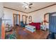 Spacious living room with hardwood floors, ample seating, and a classic rug, perfect for entertaining guests at 4634 O'Hear Ave, North Charleston, SC 29405
