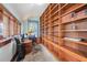 Bright and airy office features built-in shelving, and a large window at 4634 O'Hear Ave, North Charleston, SC 29405