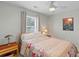 Bedroom featuring a window offering natural light and a cozy bed with a patterned quilt at 471 Springfield Rd, Mount Pleasant, SC 29464
