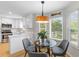 Bright breakfast nook adjacent to a modern kitchen featuring stainless steel appliances at 471 Springfield Rd, Mount Pleasant, SC 29464