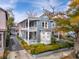 Charming two-story home featuring double porches, well-maintained landscaping, and a welcoming facade on a sunny day at 48 Montagu St # B, Charleston, SC 29401