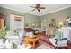 Comfortable living room with bright windows, offering views and natural light at 48 Montagu St # B, Charleston, SC 29401