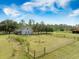 Aerial view of the property, featuring a spacious lot, well-maintained landscaping, and charming home at 4801 Coon Club Rd, Meggett, SC 29449
