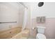Bathroom with bathtub, shower and tile flooring at 4801 Coon Club Rd, Meggett, SC 29449