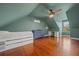 A spacious bedroom features hardwood floors, built-in storage, and a cozy window nook at 4801 Coon Club Rd, Meggett, SC 29449