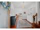 Bright foyer with hardwood floors, stylish decor, and an inviting view into the adjacent living spaces of the home at 4801 Coon Club Rd, Meggett, SC 29449