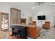 Inviting living room featuring a fireplace, hardwood floors, and comfortable seating, perfect for gatherings at 4801 Coon Club Rd, Meggett, SC 29449