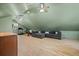 A spacious living room area features light floors, unique ceilings, a sectional, and exercise equipment at 4801 Coon Club Rd, Meggett, SC 29449