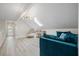 Living room with skylight, stylish furniture, adjacent to entry door and hallway at 4801 Coon Club Rd, Meggett, SC 29449