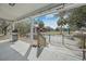 Outdoor pool with a spacious deck, perfect for relaxation and entertainment, surrounded by lush landscaping at 4801 Coon Club Rd, Meggett, SC 29449