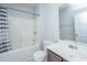 A clean, well-lit bathroom features a tub with shower and a vanity with sink at 5024 Wapiti Way, Hollywood, SC 29449