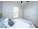 Bright bedroom featuring a window, ceiling fan, and closet at 5024 Wapiti Way, Hollywood, SC 29449