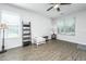 Bright living room featuring wood floors, recessed lights, a ceiling fan, and multiple windows at 5024 Wapiti Way, Hollywood, SC 29449