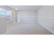 A well-lit bedroom with neutral paint and carpet, offering a serene space with a window for natural light at 505 Greywood Ln, Goose Creek, SC 29445