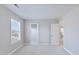 A bright bedroom with neutral paint and carpet, providing a serene space with a walk-in closet at 505 Greywood Ln, Goose Creek, SC 29445