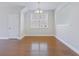 Charming dining room with hardwood floors, a large window, and neutral wall color at 505 Greywood Ln, Goose Creek, SC 29445