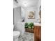 Modern bathroom with a stackable washer-dryer, a sink, and decorative tile floor at 507 Stinson Dr # 5E, Charleston, SC 29407