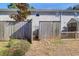 Townhome exterior with a small, fenced backyard and a brick facade at 507 Stinson Dr # 5E, Charleston, SC 29407