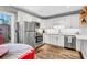 Modern kitchen featuring stainless steel appliances, white cabinets and a view to the outside patio at 507 Stinson Dr # 5E, Charleston, SC 29407