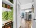 Modern kitchen featuring stainless steel appliances, white cabinetry, and an adjacent dining area at 507 Stinson Dr # 5E, Charleston, SC 29407