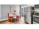 A dining area with a table for two is just off the kitchen with stainless steel appliances at 507 Stinson Dr # 5E, Charleston, SC 29407