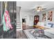 Inviting living room featuring a cozy seating area, ceiling fan, staircase, and stylish decor at 507 Stinson Dr # 5E, Charleston, SC 29407