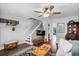 Cozy living room featuring a TV, comfortable sofa, ceiling fan, and stylish decor at 507 Stinson Dr # 5E, Charleston, SC 29407