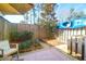 Private backyard patio with an umbrella, outdoor furniture, and a privacy fence at 507 Stinson Dr # 5E, Charleston, SC 29407