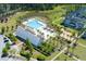 Expansive aerial view showcases community pool, clubhouse, lush landscaping, and well-designed homes at 509 Rhythm St, Summerville, SC 29486