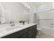Bathroom with double sink vanity, quartz countertop and shower-tub combo at 509 Rhythm St, Summerville, SC 29486